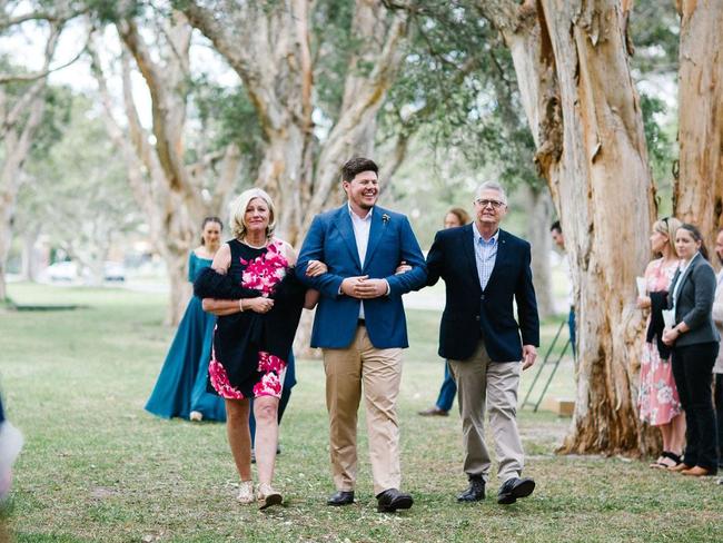 Here comes the groom … Angus accompanied by his parents. Picture: Supplied