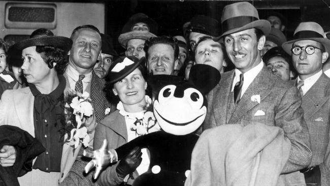 Walt Disney and his wife arrive in London in 1938.