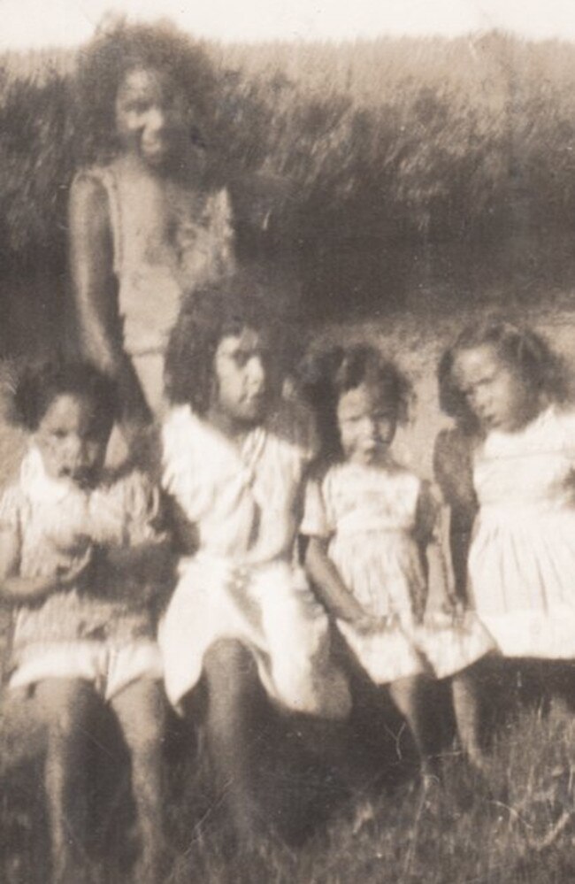 Joyce, back row, as a child, pictured with family members.