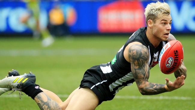 What should Collingwood do with injury-riddled star Jamie Elliot? Picture: Mark Stewart