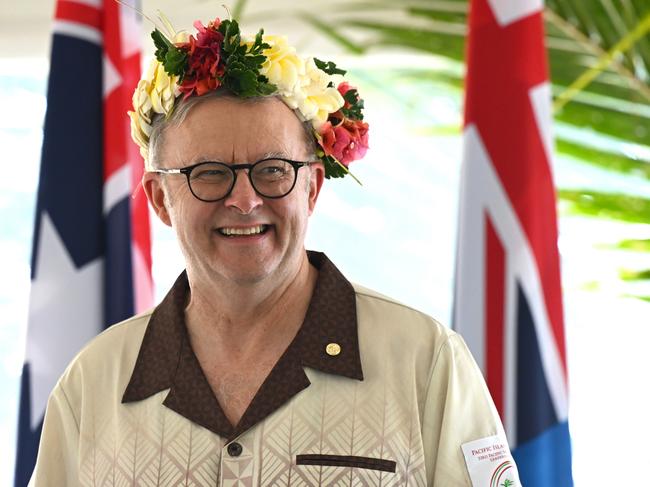 Australian Prime Minister Anthony Albanese wears a floral head piece at the Pacific Islands Forum Leaders Meeting. Picture: AAP Image/Lukas Coch