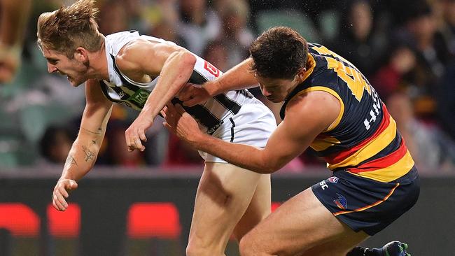 Sam Murray and Mitch McGovern collide.