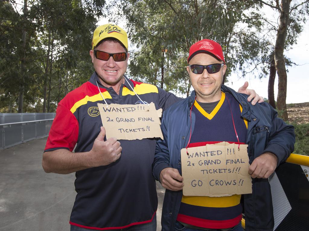 Crows fans, Matthew Cold and Danny Potuszynski drove to Melbourne overnight in the hope of scoring tickets to the 2017 AFL Grand Final. Picture: Sarah Matray