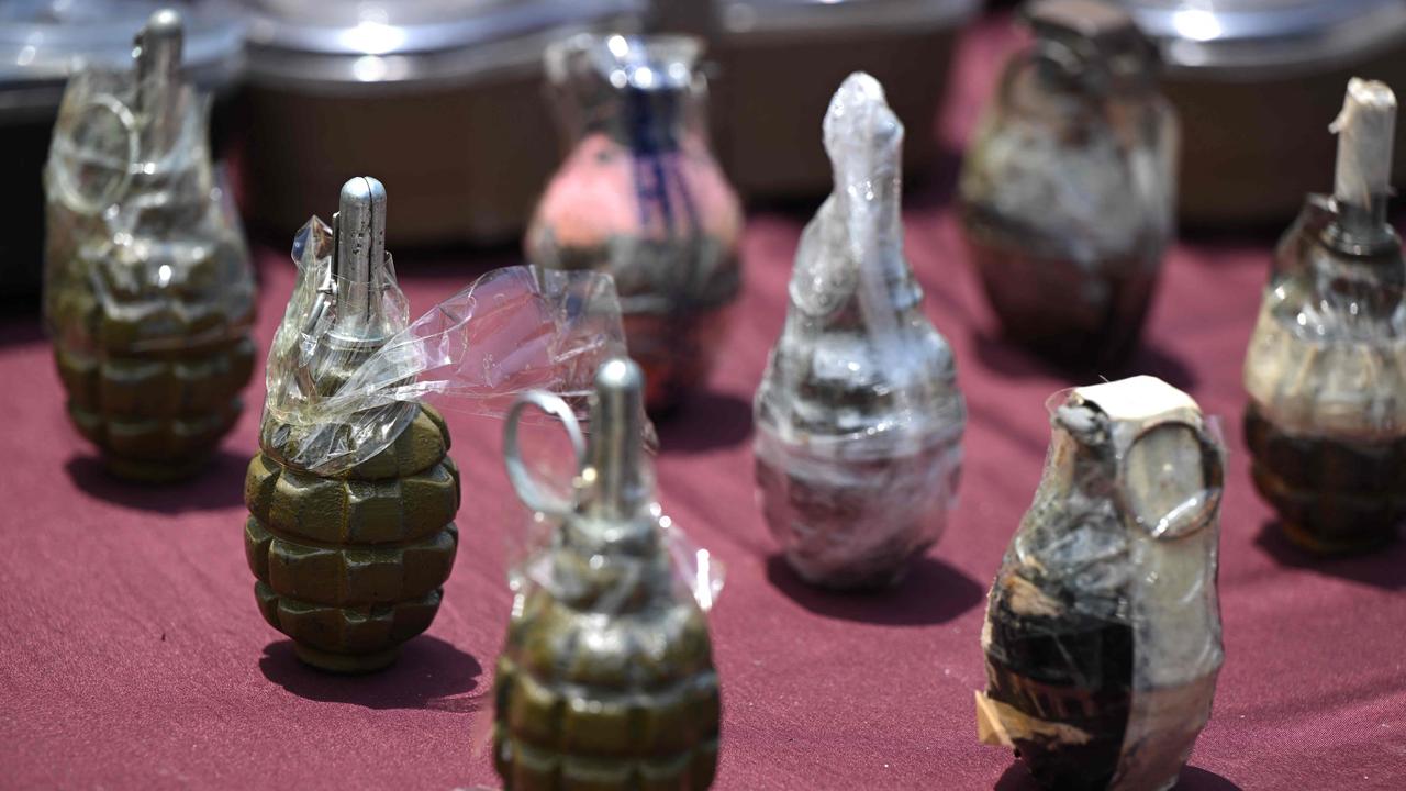 Grenades confiscated inside the Tocoron prison. Picture: Yuri Cortez/AFP