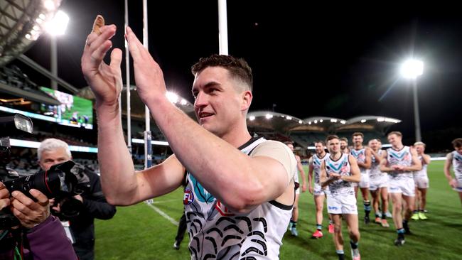 Tom Rockliff leaves the ground after his 200th game in Port’s win over Hawthorn. Picture: James Elsby (Getty).