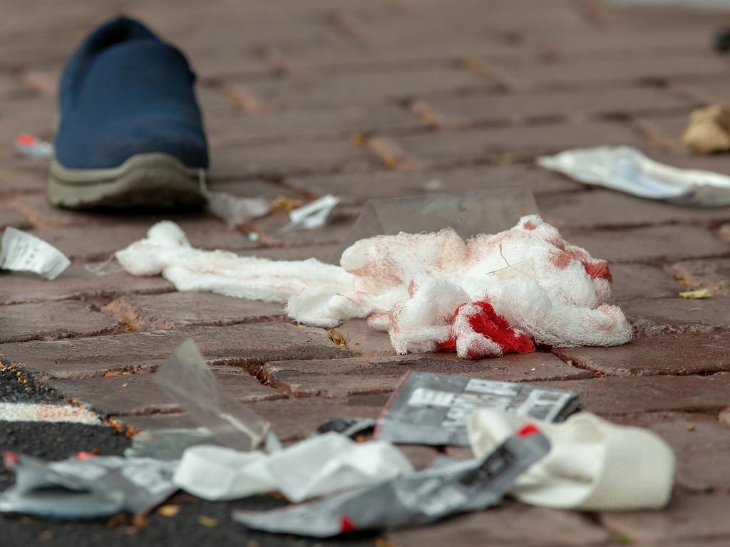 Bloodied bandages are seen on the road following the shooting at the Masjid Al Noor mosque in Christchurch. Picture: Martin Hunter/AAP