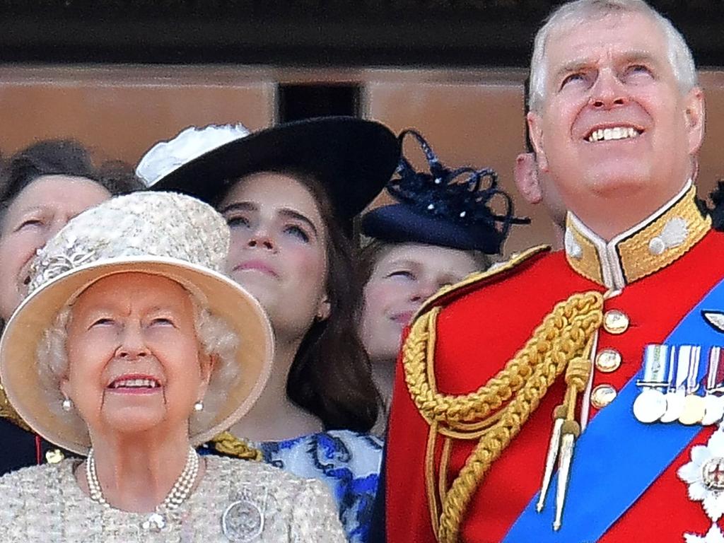 Queen Elizabeth II with Prince Andrew, Duke watch a fly-past of aircraft by the Royal Air Force York on the balcony of Buckingham Palace. Picture: Daniel Leal-Olivas/AFP