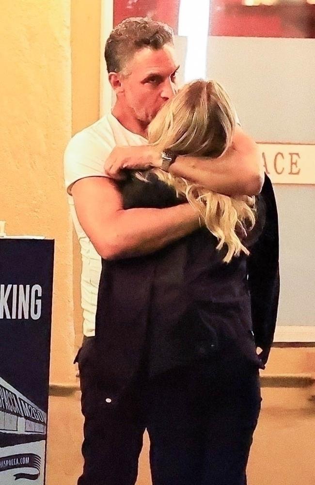 Mauricio Umansky gets hot and heavy with a mystery woman. Picture: BACKGRID