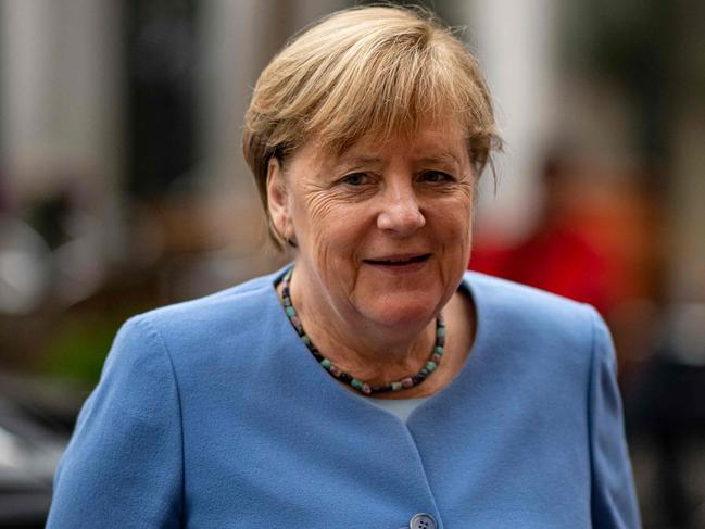 German Chancellor Angela Merkel arrives to attend the annual reception of the German Bishops in Berlin on September 27, 2021. (Photo by Fabian Sommer / dpa / AFP)