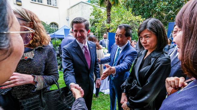 Simon Birmingham is introduced to guests by Shanghai Cred’s founder/chairman Gui Guojie at an Australian consulate function in Shanghai yesterday. Picture: Chris Crerar