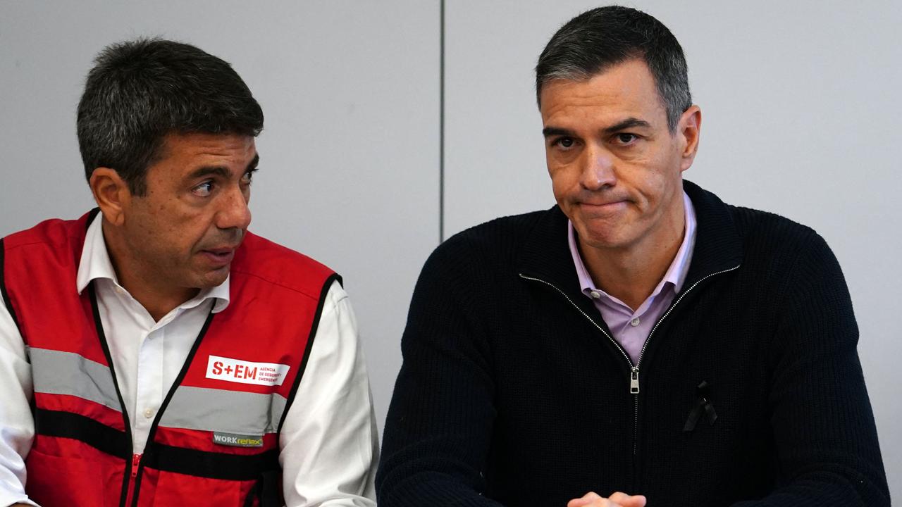 Spanish Prime Minister Pedro Sanchez, right, and Valencia regional president Carlos Mazon, left, are among those officials whose response has been criticised by flood survivors. Picture: Manaure Quintero/AFP