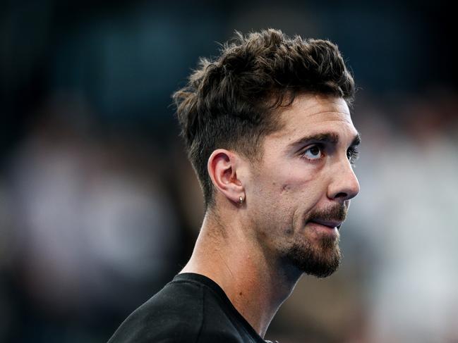 Thanasi Kokkinakis admits he is still struggling with injury ahead of his Australian Open campaign. Picture: Getty Images