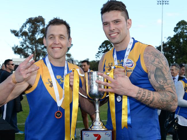 Deer Park coach Marc Bullen and former captain Chris Stewart show off the club’s 2015 premiership cup. Picture: David Smith