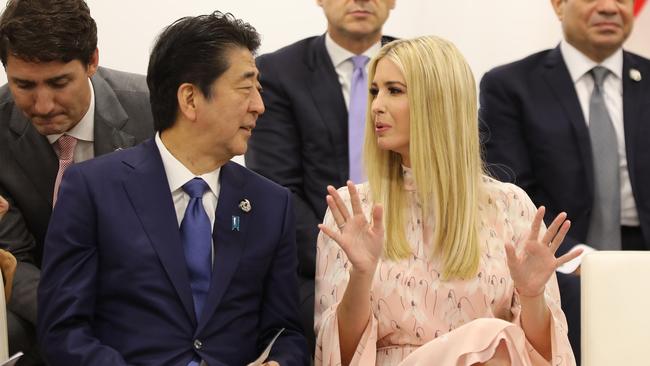 Japan's former Prime Minister Shinzo Abe talks to Adviser to the US President Ivanka Trump at the G20 Summit in Osaka on June 29, 2019. Picture: Dominique Jacovides/Pool/AFP