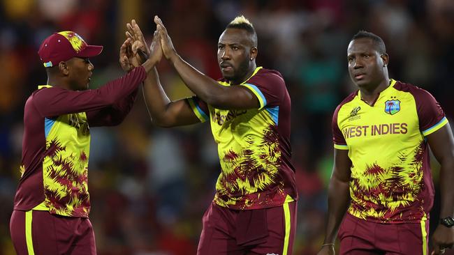 Andre Russell of West Indies celebrates with teammates after dismissing Moeen Ali of England (not pictured) during the ICC Men's T20 Cricket World Cup match this week. Picture: Getty Images