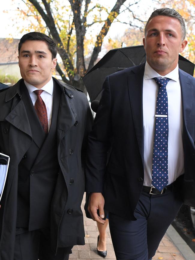 NRL star Sam Burgess leaving court with his with lawyer Bryan Wrench. Picture: NCA NewsWire / Simon Bullard