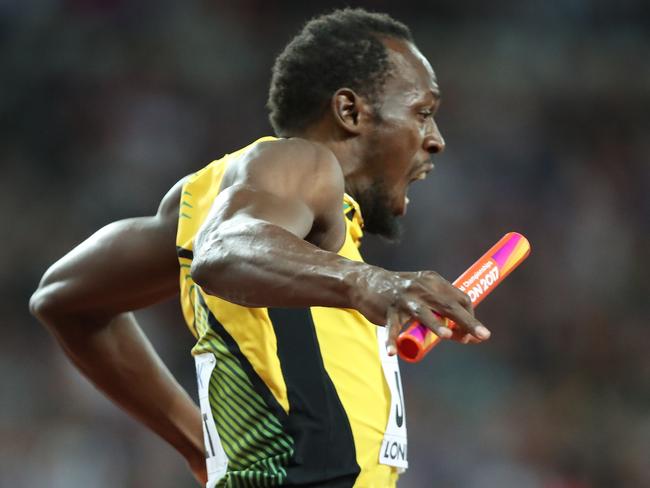 Oh, no: The moment Usain Bolt knew something was wrong. Picture: AFP