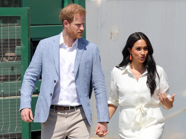 Prince Harry and Meghan make their first appearance since announcing they are taking legal action. Picture: Chris Jackson/Getty Images