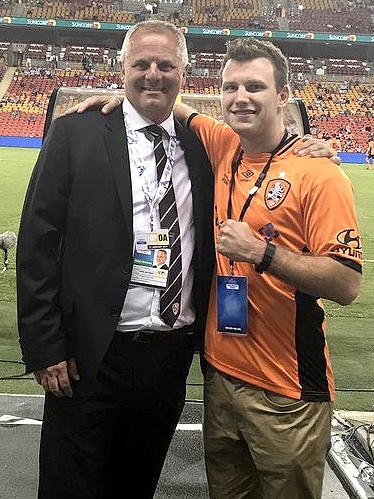 Mark Kingsman and boxer Jeff horn at a Roar game. 