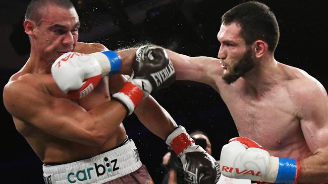 Bakhram Murtazaliev punches Tim Tszyu at the Caribe Royale Resort on October 19, 2024 in Orlando, Florida. Picture: Paul Hennessy/Anadolu via Getty Images