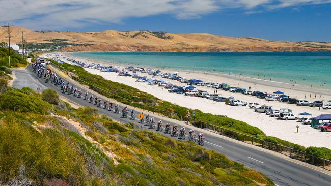 Cyclists ride along Algina Beach during Stage 3 of the 2021 Santos Festival of Cycling. Photo: Brenton. Edwards