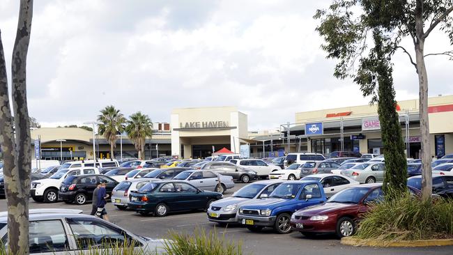 Another man was charged after allegedly coughing at people at Lake Haven Shopping Centre.