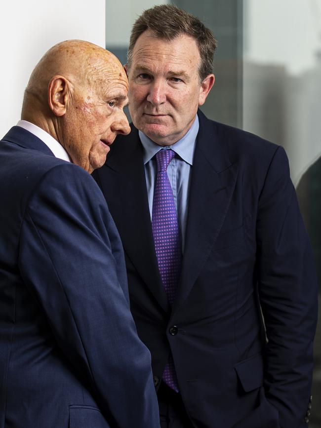 Premier Investments chair Solomon Lew (L) and chief executive Mark McInnes chat before posing for a photograph in Melbourne, Picture: NCA NewsWire / Daniel Pockett