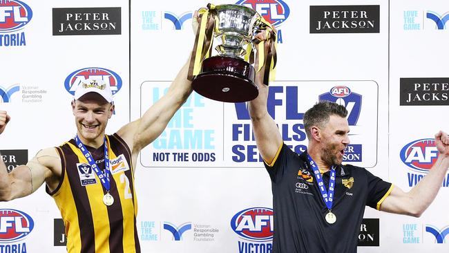 Box Hill Hawks’ captain Andrew Moore and coach Chris Newman celebrate after winning the VFL Grand Final in 2018. Picture: Michael Dodge