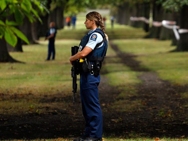 Police officers guard the area close to the Masjid al Noor mosque after the mass shooting. Picture: AFP