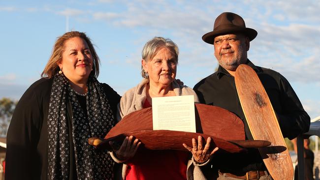 Megan Davis, Pat Anderson (holding piti with Uluru Statement From The Heat inside) and Noel Pearson at the closing ceremony of the Indigenous Constitutional Convention held at Mutitjulu in 2017. Picture: James Croucher