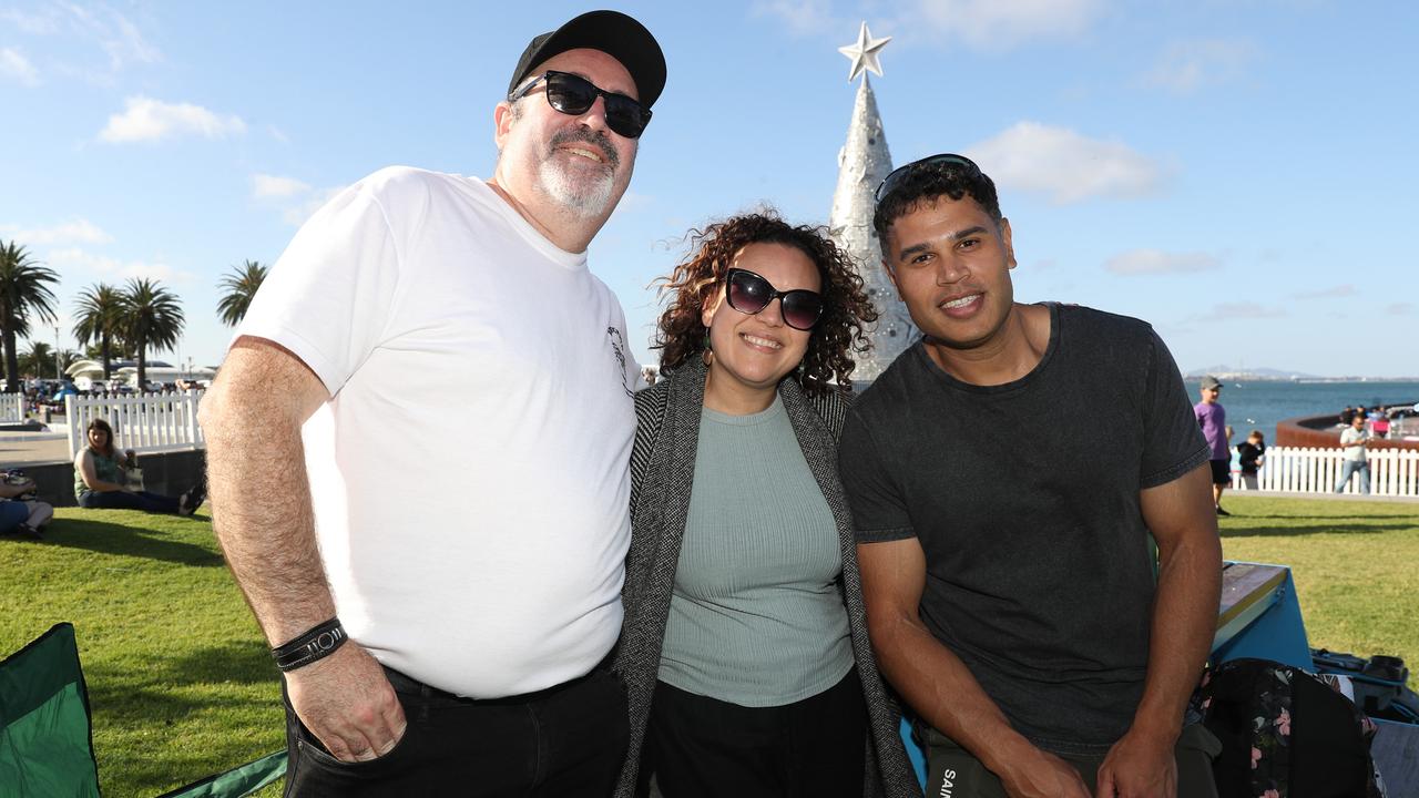 Michael and Karen Wilson and Gary Andrews. Locals and visitors arrived early to get a good spot for the Geelong New Years Eve celebrations. Picture: Alan Barber