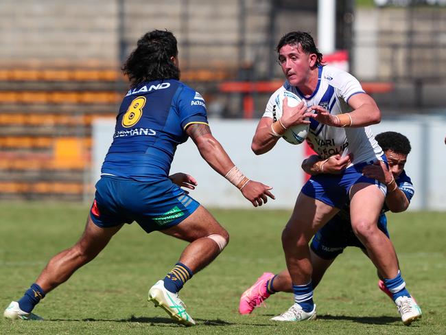 Logan Spinks takes on the Parramatta defence. Picture: Adam Wrightson Photography