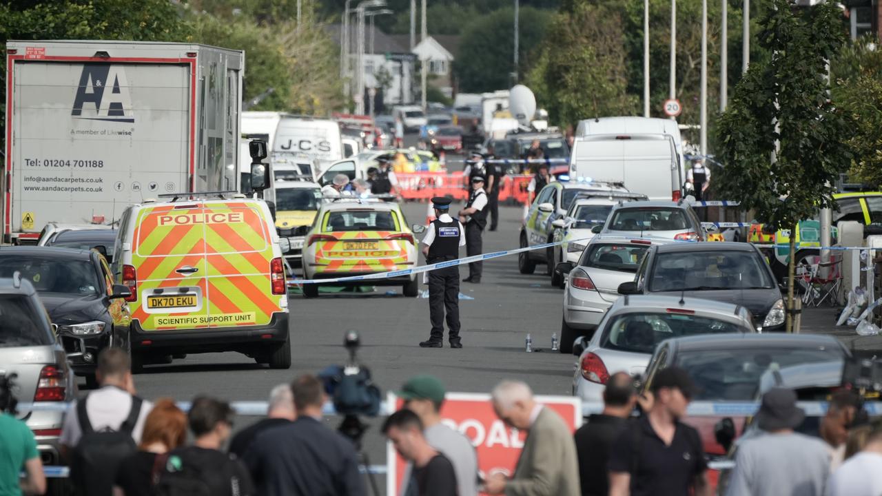 Police and forensic officers attend the scene of a multiple stabbing attack in Southport, England. Picture: Getty Images