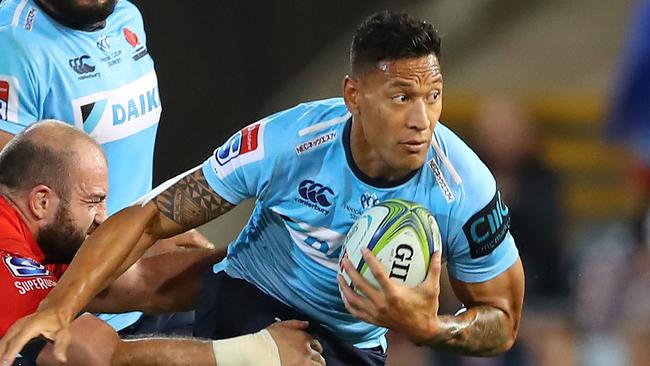 NEWCASTLE, AUSTRALIA - MARCH 29: Israel Folau of the Waratahs is tackled during the round seven Super Rugby match between the Waratahs and the Sunwolves at McDonald Jones Stadium on March 29, 2019 in Newcastle, Australia. (Photo by Tony Feder/Getty Images)