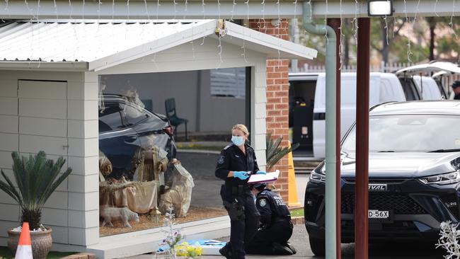 Police investigating after a mob descended in Wakeley after Assyrian Bishop Emmanuel Mar Mari was allegedly stabbed in a terror-related incident. Picture: Rohan Kelly