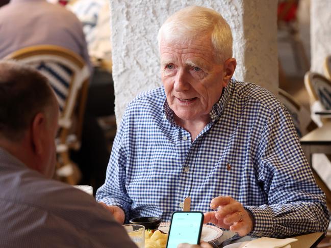 Terry O'Gorman talks with Michael Madigan at the Breakfast Creek Hotel. Picture: Liam Kidston