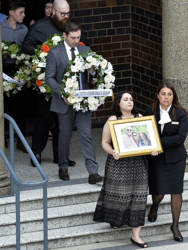 Family and friends gather to farewell Lars, Vivian and Annabelle Falkholt. Picture: AAP