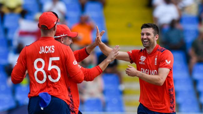 Mark Wood celebrates. Photo by Randy Brooks / AFP.