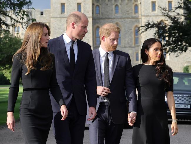 The quartet walked down the driveway at Windsor to greet waiting crowds and look at tributes left to the Queen. Picture: Getty Images