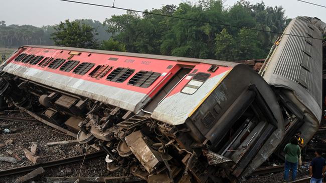 Damaged carriages are seen at the accident site. Picture: AFP