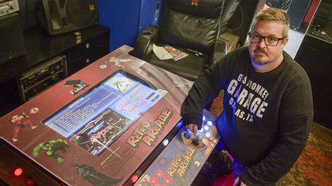 Vintage gamer first to be charged under crime gang pokies laws