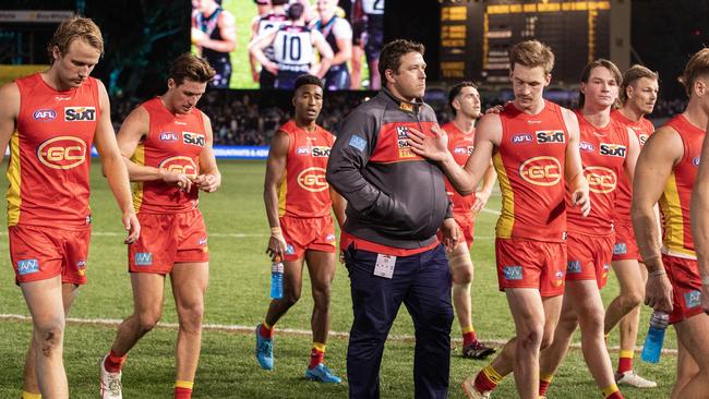 Stuart Dew with his team after the Suns’ Round 17 loss to Port Adelaide at Adelaide Oval. Photo by Sarah Reed/AFL Photos via Getty Images