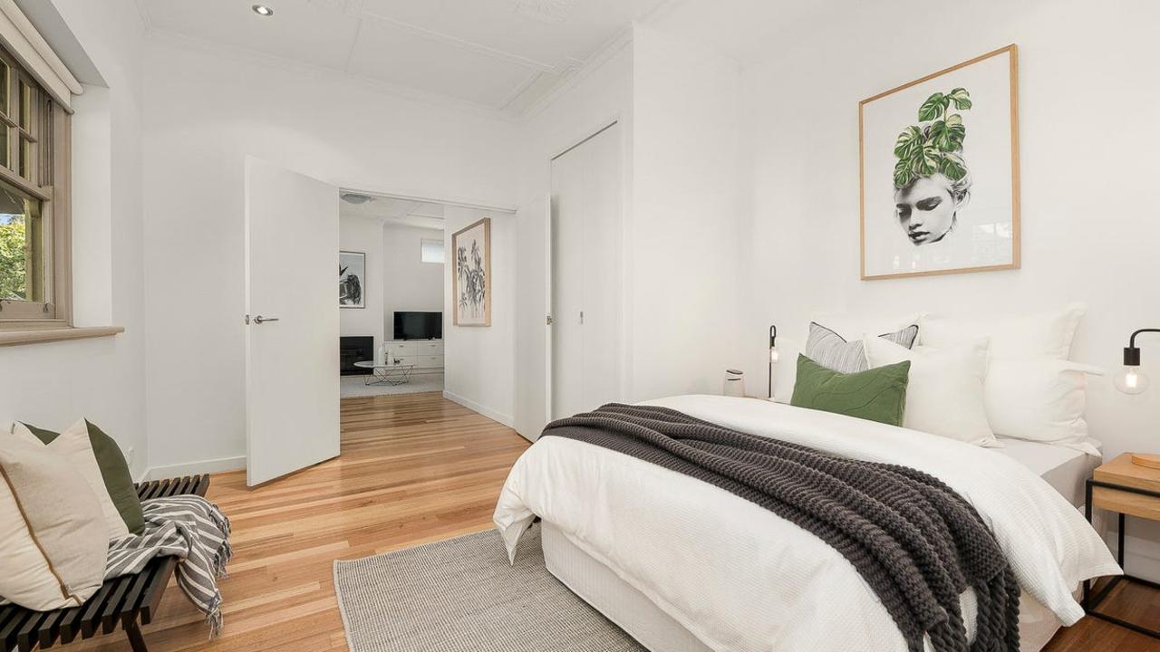 One of three spacious bedrooms at the home.