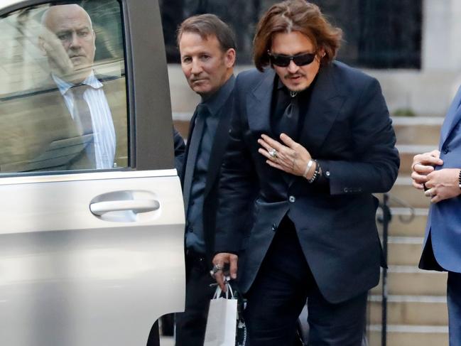 The Hollywood star en route to court. Picture: AFP