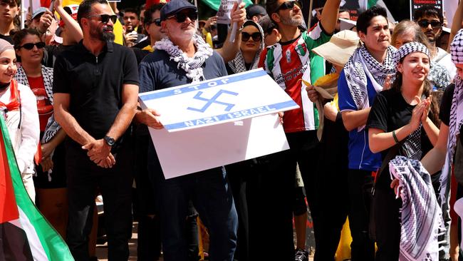 Al Yazbek with a Nazi like symbol on it at the protest in Hyde Park. Picture: NewsWire / Damian Shaw