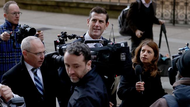 Ben Roberts-Smith is surrounded by media as he arrives at Federal Court in Sydney for the high-profile defamation showdown. Picture: NCA NewsWire / Dylan Coker