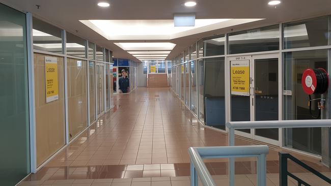 An upstairs arcade in the Citilink building in Flinders Street, Townsville, is largely vacant.