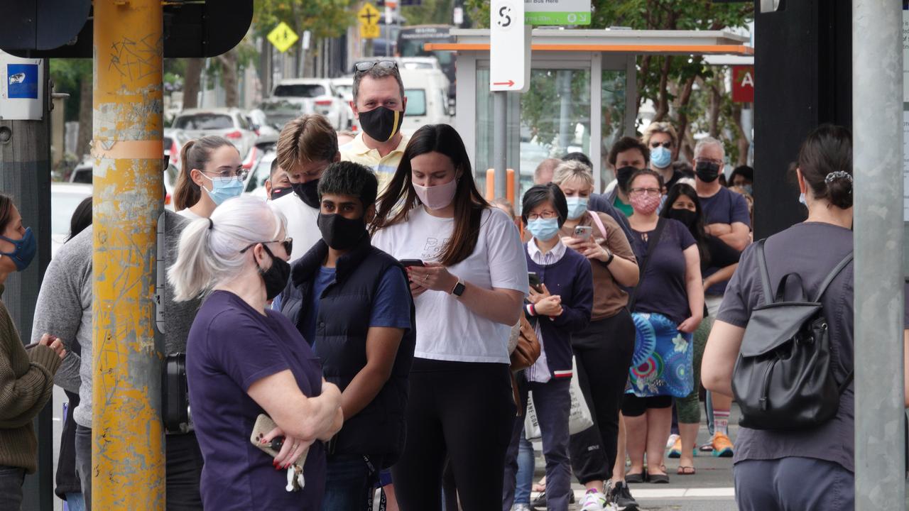 A large queue of people lining up for rapid antigen tests outside a Hawthorn East pharmacy. Picture: Alex Coppel.