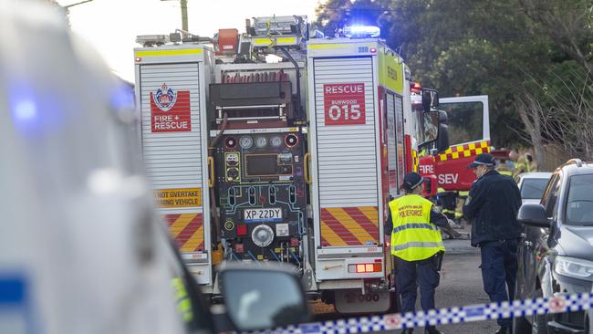 Police and fire investigators at the scene. Picture: NewsWire / Jeremy Piper