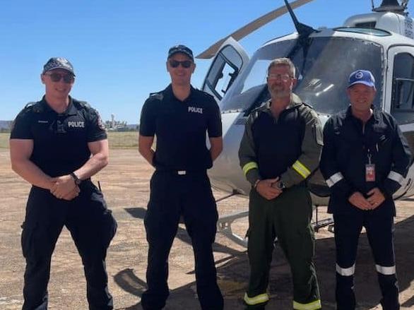 NT police and fire personnel have been working over the Christmas period to put out fires near Alice Springs. Picture: Facebook/Simon Casey